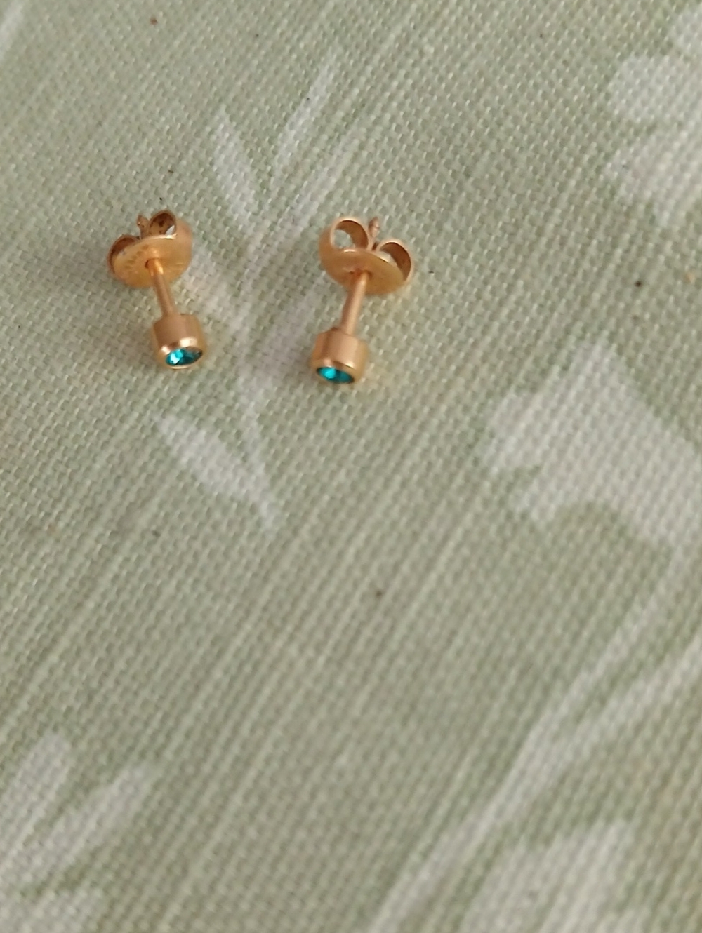 Gold Tone Stud Earrings with Teal Crystal Accent
